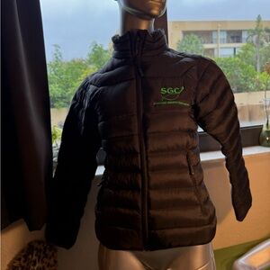Storm Women's Black Quilted Packable Puffer Jacket with Green Logo